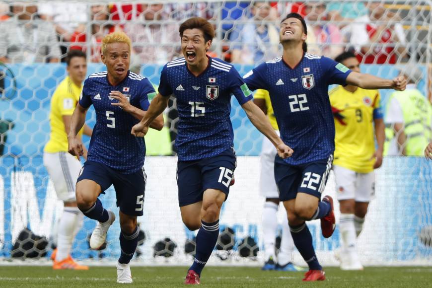 Yuya Osako celebrating after scoring a goal in the second half.