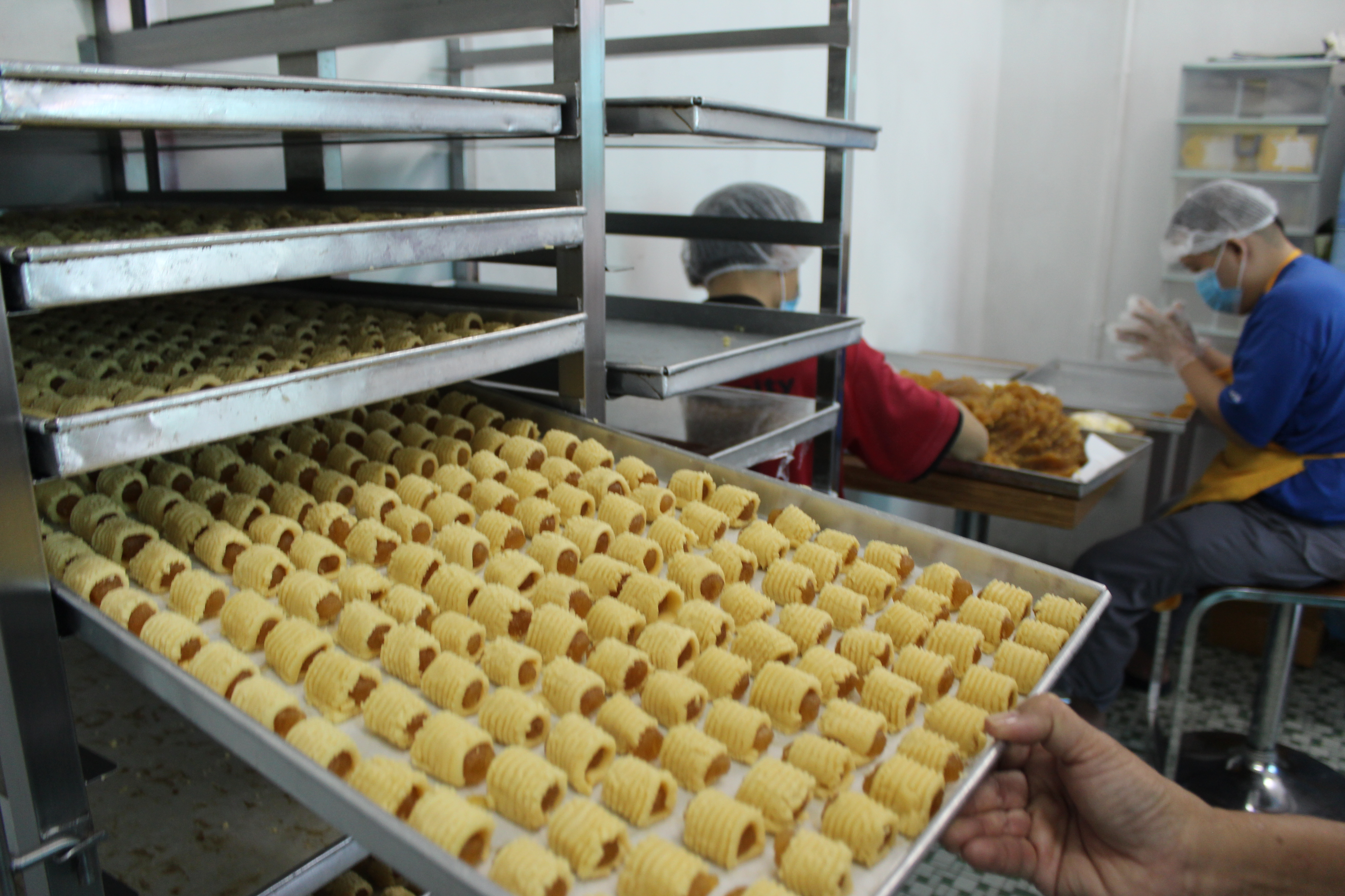 Rolling thousands of pineapple tarts is no easy feat.